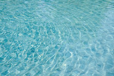 Yüzme havuzunda soyut mavi renk su dalgası arkaplan için saf doğal girdap desen dokusu kullanımı