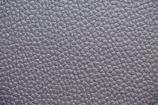 Yumuşak desenli Mor Deri 'nin yakın çekimi. Yüzey küçük, eşit aralıklı tahıllarla kaplı, pürüzsüz ve lüks bir görünüm sağlıyor. Nötr renk ve doğal doku onu çok yönlü bir arkaplan yapar.