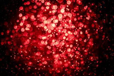 Görünür kırmızı noktalı bulanık fotoğraf, ışıl ışıl parlıyor. Duvar kağıdı olarak kullanılabilecek kadar lüks görünüyor.