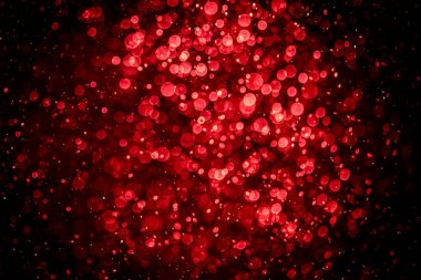 Görünür kırmızı noktalı bulanık fotoğraf, ışıl ışıl parlıyor. Duvar kağıdı olarak kullanılabilecek kadar lüks görünüyor.