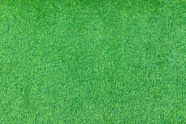 Detaylı deseni ve canlı rengi olan yemyeşil yapay çimenlere yakın çekim