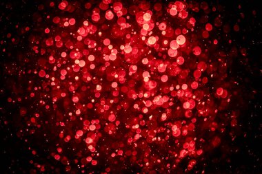 Görünür kırmızı noktalı bulanık fotoğraf, ışıl ışıl parlıyor. Duvar kağıdı olarak kullanılabilecek kadar lüks görünüyor.