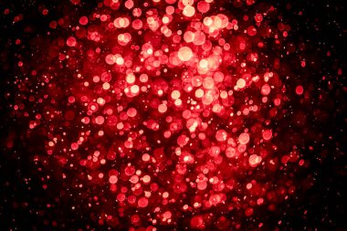 Görünür kırmızı noktalı bulanık fotoğraf, ışıl ışıl parlıyor. Duvar kağıdı olarak kullanılabilecek kadar lüks görünüyor.