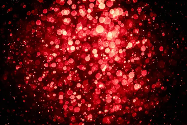 Görünür kırmızı noktalı bulanık fotoğraf, ışıl ışıl parlıyor. Duvar kağıdı olarak kullanılabilecek kadar lüks görünüyor.