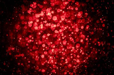 Görünür kırmızı noktalı bulanık fotoğraf, ışıl ışıl parlıyor. Duvar kağıdı olarak kullanılabilecek kadar lüks görünüyor.