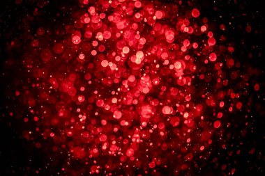 Görünür kırmızı noktalı bulanık fotoğraf, ışıl ışıl parlıyor. Duvar kağıdı olarak kullanılabilecek kadar lüks görünüyor.