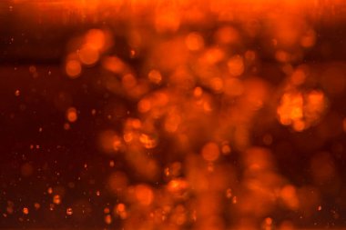 Siyah arkaplanda kırmızı ışık bokeh