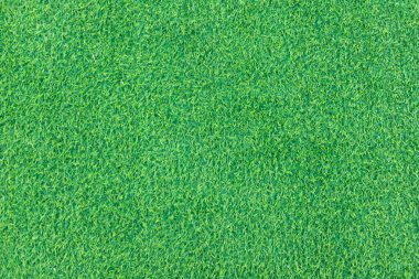 Detaylı deseni ve canlı rengi olan yemyeşil yapay çimenlere yakın çekim