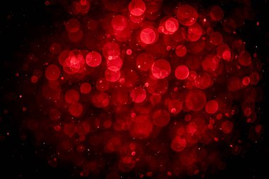 Görünür kırmızı noktalı bulanık fotoğraf, ışıl ışıl parlıyor. Duvar kağıdı olarak kullanılabilecek kadar lüks görünüyor.