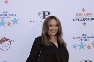 Studio City, CA - June 15, 2024: Catherine Bach attends the Ed Asner Celebrity Poker to Benefit Autism research.