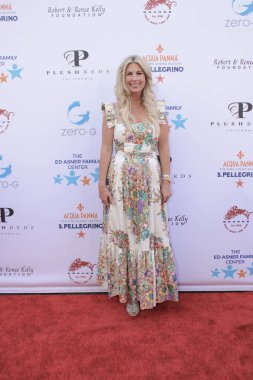 Studio City, CA - June 15, 2024: Courtney Warner attends the Ed Asner Celebrity Poker to Benefit Autism research.