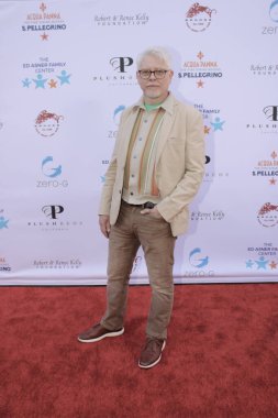 Studio City, CA - June 15, 2024: Dave Foley attends the Ed Asner Celebrity Poker to Benefit Autism research.