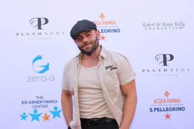 Studio City, CA - June 15, 2024: David Josh Lawrence attends the Ed Asner Celebrity Poker to Benefit Autism research.