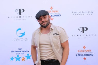 Studio City, CA - June 15, 2024: David Josh Lawrence attends the Ed Asner Celebrity Poker to Benefit Autism research. clipart