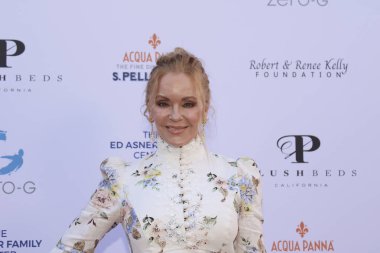 Studio City, CA - June 15, 2024: Jill Whelan attends the Ed Asner Celebrity Poker to Benefit Autism research.