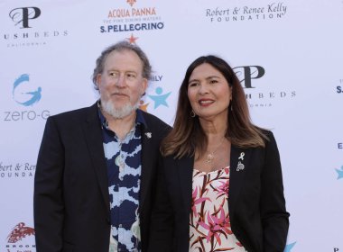 Studio City, CA - June 15, 2024: Matt Asner and Navah Paskowitz Asner attend the Ed Asner Celebrity Poker to Benefit Autism research.