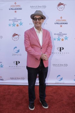 Studio City, CA - June 15, 2024: Tom Kenny, the voice of SpongeBob Squarepants, attends the Ed Asner Celebrity Poker to Benefit Autism research.