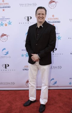 Studio City, CA - June 15, 2024: Tom Malloy attends the Ed Asner Celebrity Poker to Benefit Autism research.
