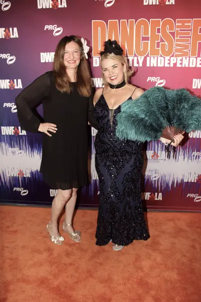 stock image Hollywood, CA - June 22, 2024: Sharon Gillen and Marci Darling attend the Dances with Films Film Festival, held at the TCL Theater in Hollywood, CA.