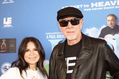 Los Angeles, CA - October 2, 2024: Red carpet arrivals for the premiere of Holy Cash, held at the AMC Theater in Century City, California. The event was attended by Paul Rodriguez, writer and producer of the movie. clipart