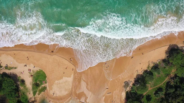 Aerial drone footage of sea ocean waves reaching shore.Beach with aerial drone. Beach clear turquoise top view. Beautiful beach.