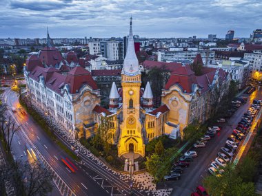 Aerial view of the Piarist church-chapel and their high school complex. Photo was taken on the 17th of April 2023 in Timisoara, the European Cultural Capital of 2023, Timis County, Romania. clipart