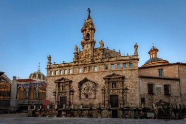 Sant Joan del Mercat or Santos Juanes Roman Catholic church rear facade. Photo was taken on the 11th of February 2023 in Valencia, Spain. clipart