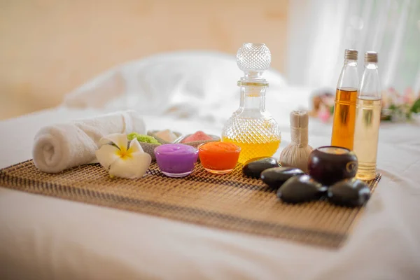The colorful bottles add to the overall aesthetic appeal of the spa and create a welcoming environment for guests.