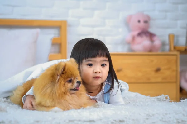 Little Girl Snuggled Her Furry Dog Friend Feeling Safe Content — Stock Photo, Image