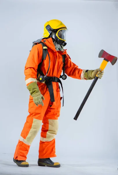 Pristine White Background Accentuates Firefighter Holding Iron Axe Presence Highlighting — Stock Photo, Image