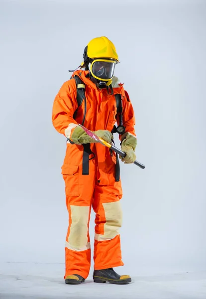 Professional Firefighter Wearing Yellow Helmet Standing Looking Examining Iron Axe — Stock Photo, Image