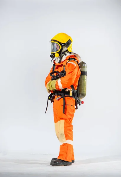 Side View Firefighter Wearing Yellow Hard Hat Standing Holding Fire — Stock Photo, Image