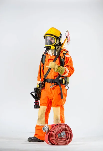 Firefighter Stands Stamped His Shoulder Fire Hose Rests Ground White — Stock Photo, Image