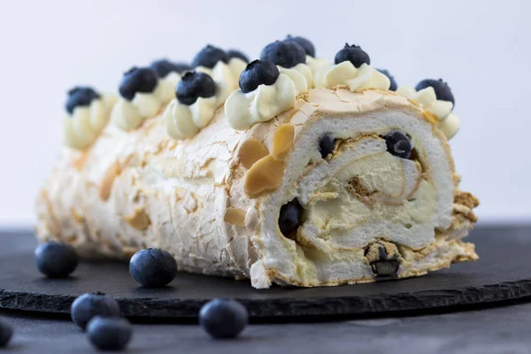 Side view of a delicious meringue roll. Good sweet morning