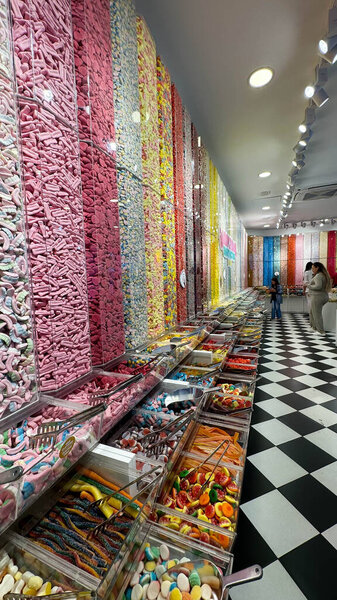 A showcase of a candy shop in Warsaw, 2024. Marshmallows of different colors