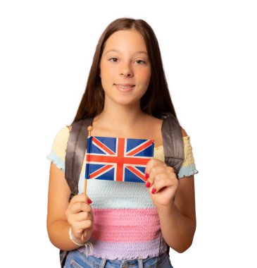 Okul konseptine geri dönelim. Elinde İngiliz bayrağı olan genç bir öğrenci şeffaf bir arkaplanda izole edilmiş. PNG şeffaf