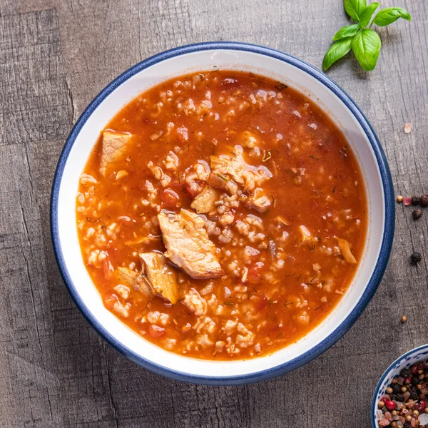 stock image kharcho red tomato soup meat, rice meal food snack on the table copy space food background 