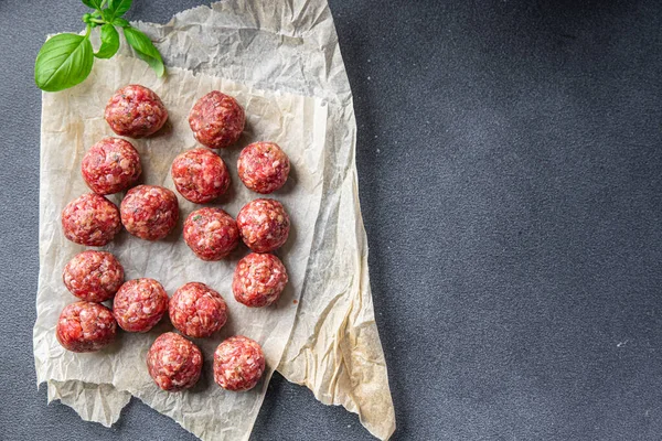 raw meatballs meat pork, beef, lamb meat balls snack meal food on the table copy space food background rustic top view