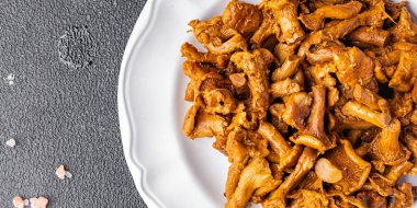 chanterelles mushroom fresh meal food snack on the table copy space food background rustic top view