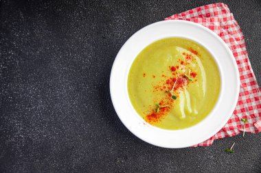 cream soup leek, vegetables, potato healthy meal food snack on the table copy space food background rustic top view keto or paleo diet veggie vegan or vegetarian food no meat