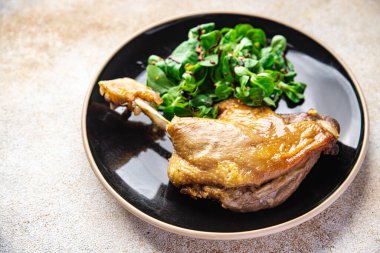 duck leg confit second course healthy meal food snack on the table copy space food background rustic top view