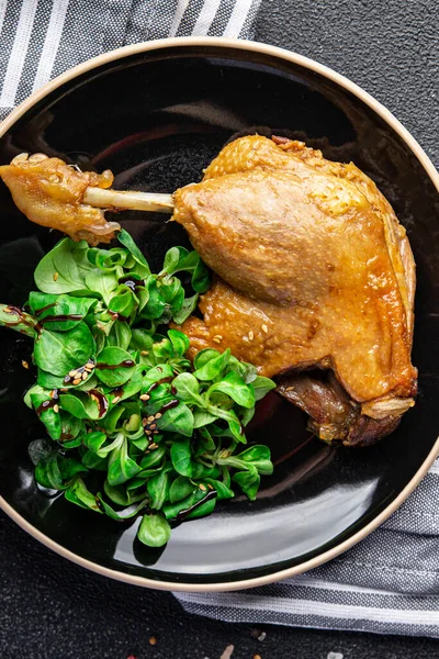 duck leg confit second course healthy meal food snack on the table copy space food background rustic top view