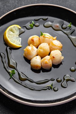 sea scallops fried seafood healthy meal food snack on the table copy space food background rustic top view