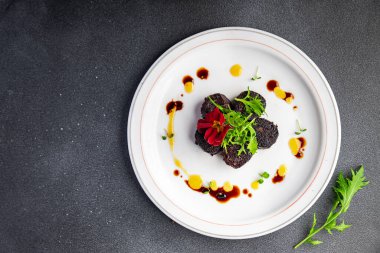 black pudding or bloody sausage healthy meal food snack on the table copy space food background rustic top view