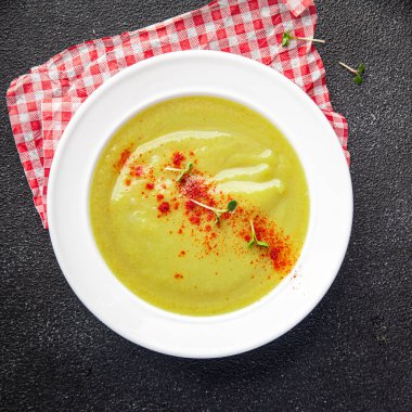 zucchini cream soup vegetable dish healthy meal food snack on the table copy space food background rustic top view