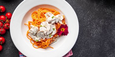 tomato spaghetti pasta with mushroom sauce healthy meal food snack on the table copy space food background rustic top view veggie vegan or vegetarian food no meat