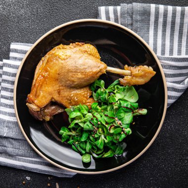 duck confit leg meat second course meal food snack on the table copy space food background rustic top view