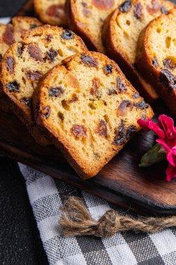 fruit cake dessert traditional pastry dried fruits, nuts meal food snack on the table copy space food background rustic top view