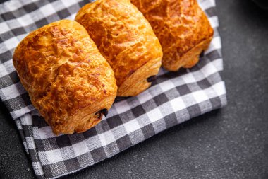 puff buns fresh bakery chocolate filling meal food snack on the table copy space food background rustic top view