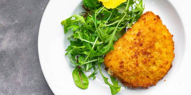 cutlet cordon bleu chicken meat, cheese, bacon healthy meal food snack on the table copy space food background rustic top view